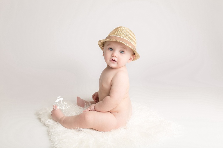 One Dimple Photography is a Dallas Fort Worth newborn and baby photographer. 7 month in studio milestone session 